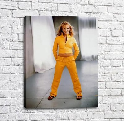 Poster cu Britney Spears într-un costum galben Tan16990 фото