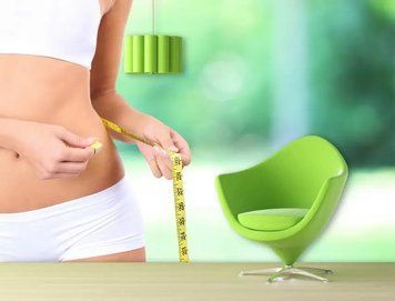 Fototapet - "Fata &icirc;și măsoară talia, fitness" Spo3050 фото
